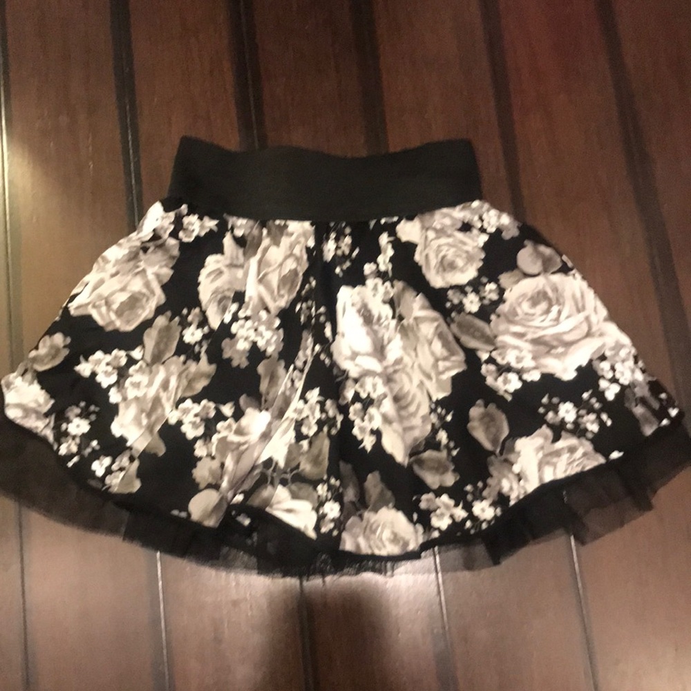Black floral mini skirt